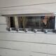 Aluminum wall coat rack with pivoting mirror from the 60s