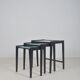 Set of nesting tables in black stained wood and glass top, 1960s