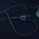 Industrial metal parabola lamp.