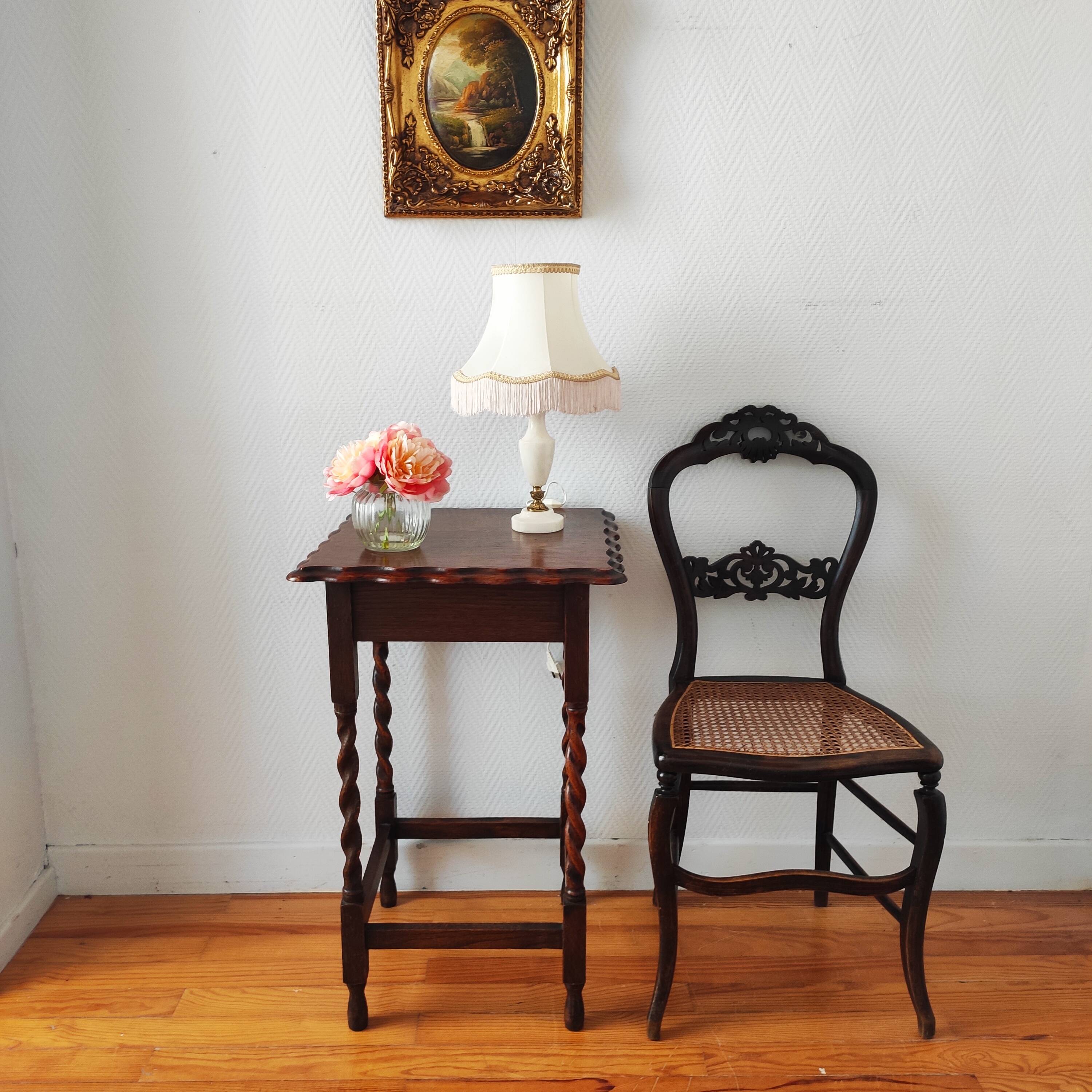 Antique solid oak side table with turned wooden legs.