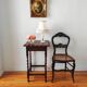 Antique solid oak side table with turned wooden legs.