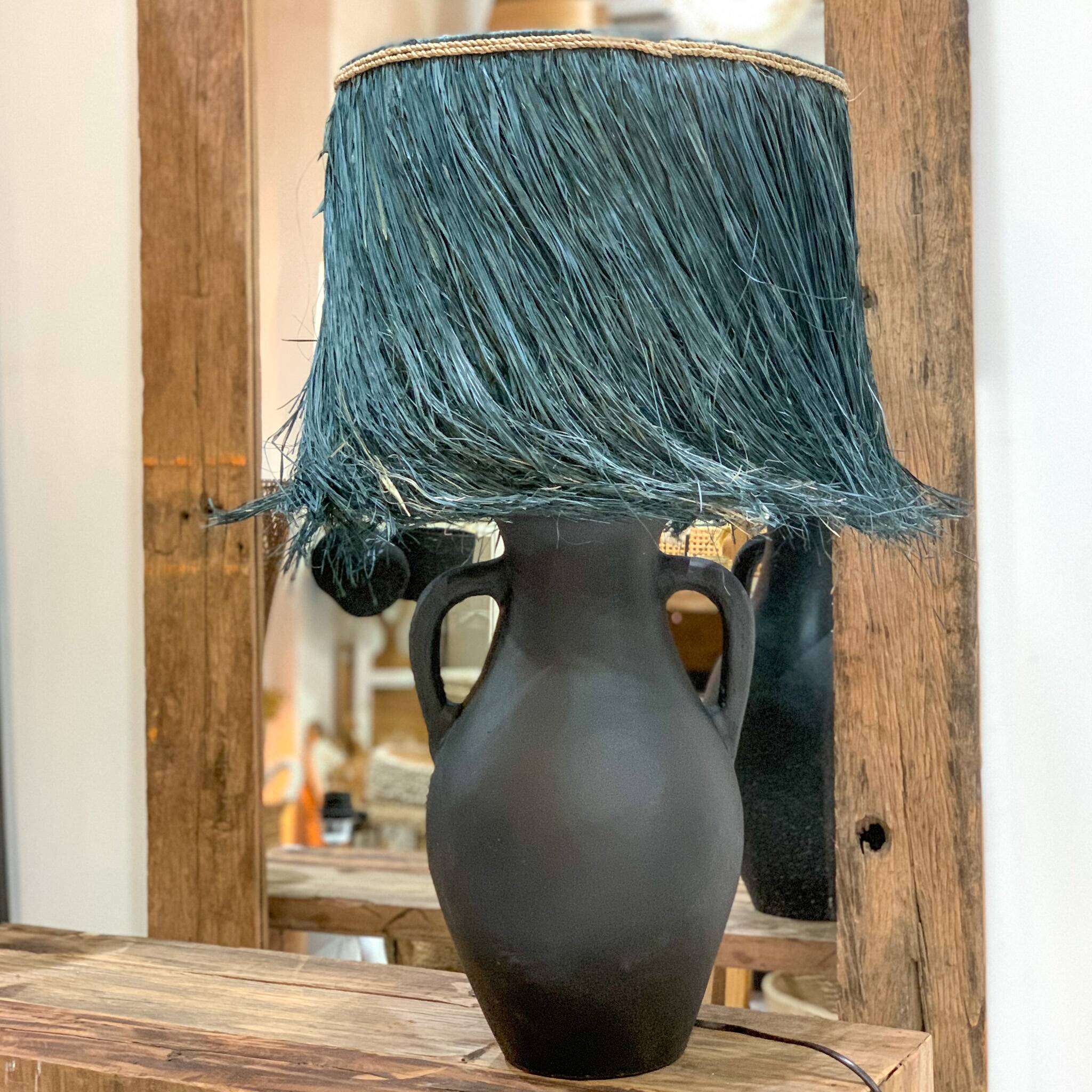 Black terracotta lamp and blue raffia lampshade