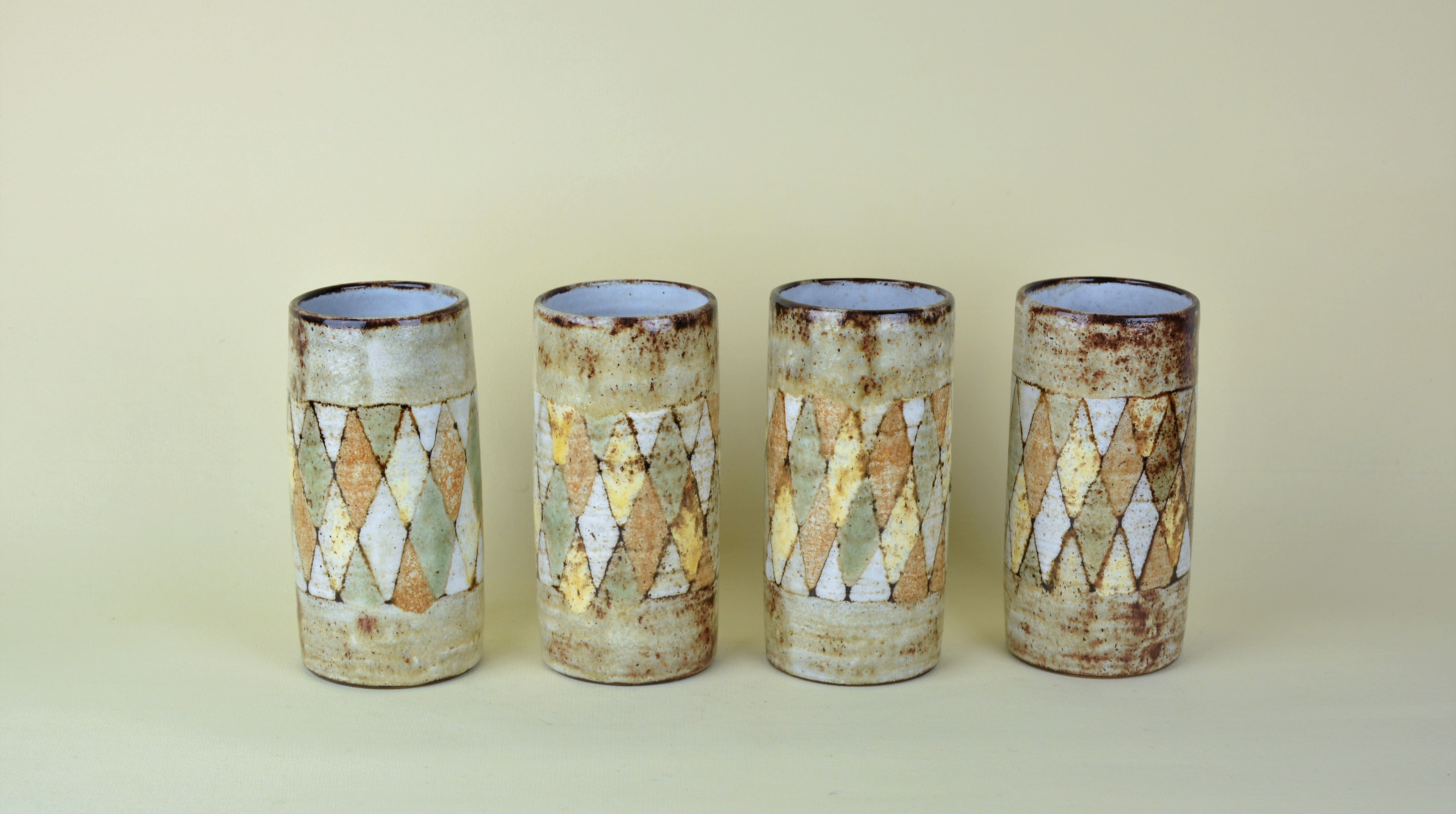 Pitcher and glasses with harlequin decoration, Atelier du Vieux Moulin