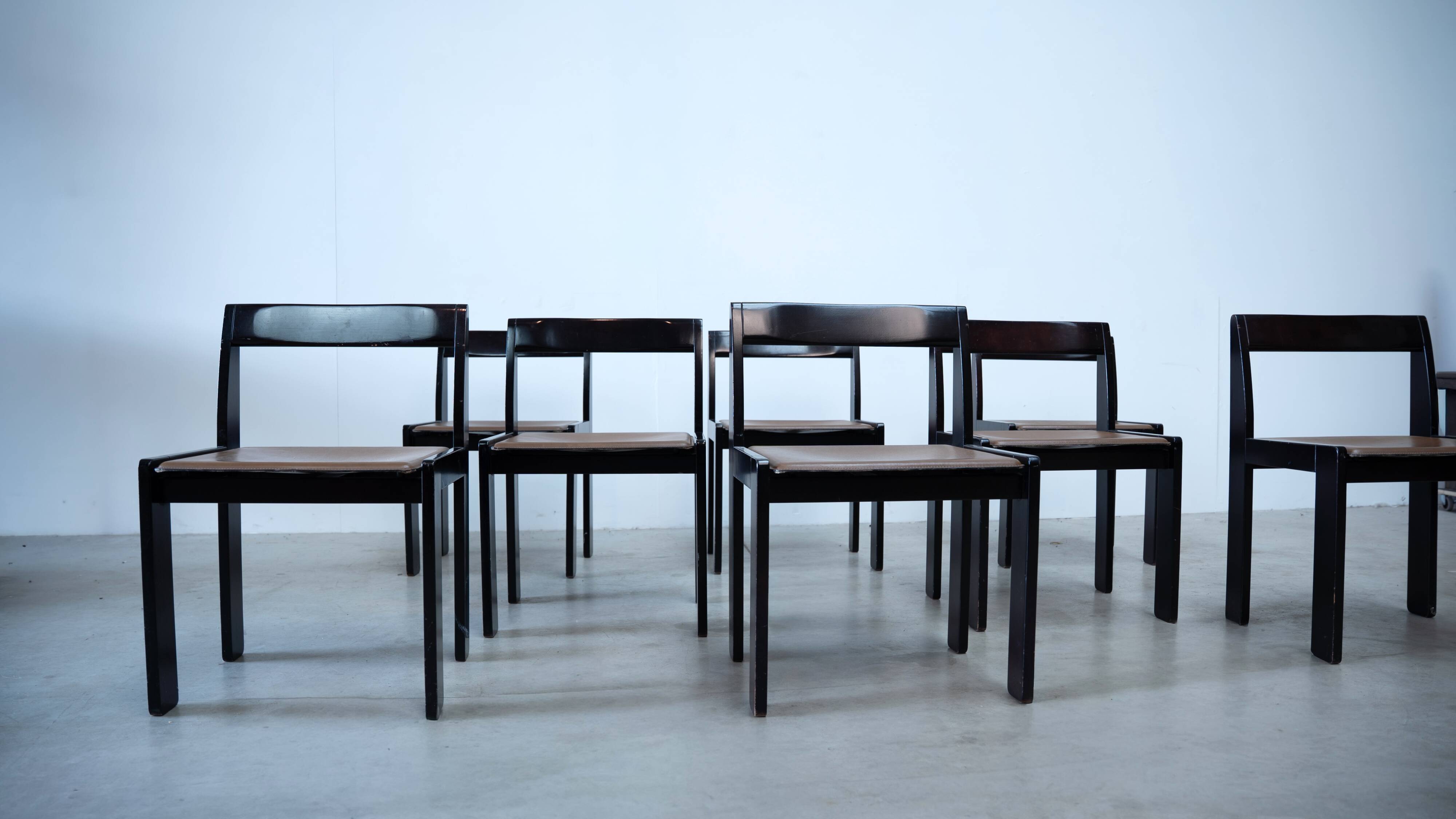 Set of eight black lacquered dining chairs