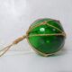 Boule, flotteur en verre vert vintage