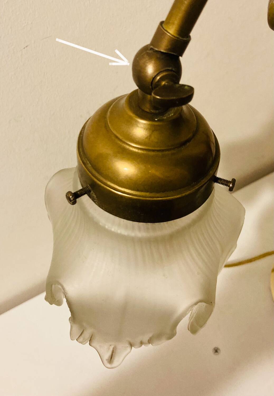 Brass table lamp with a glass shade