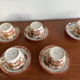 Set of 5 Sarreguemines Chinese Cups and Saucers.
