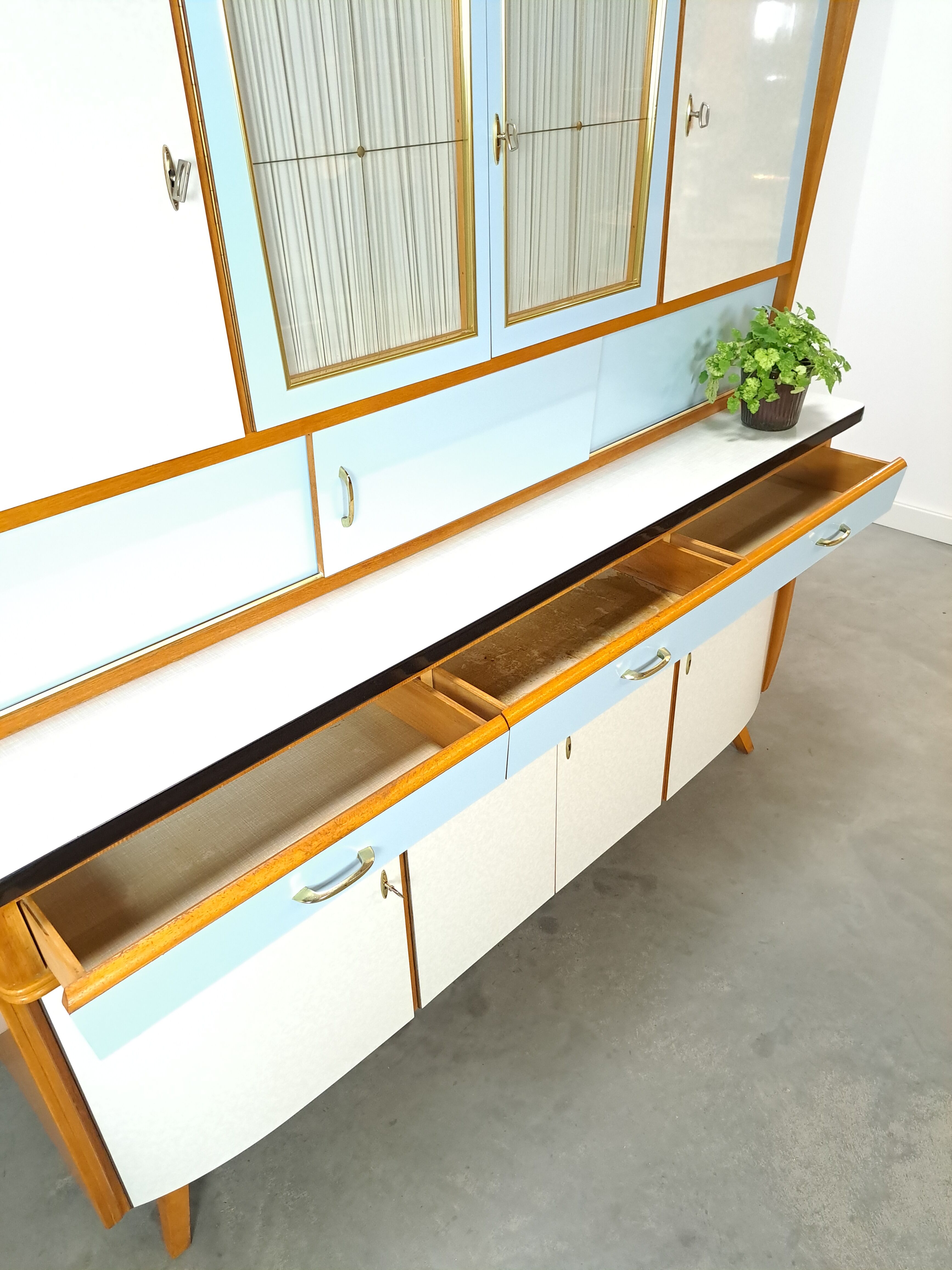 50s vintage kitchen cabinet with brass and formica