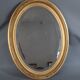 Ancien miroir ovale biseauté bois doré 63x46 cm SB