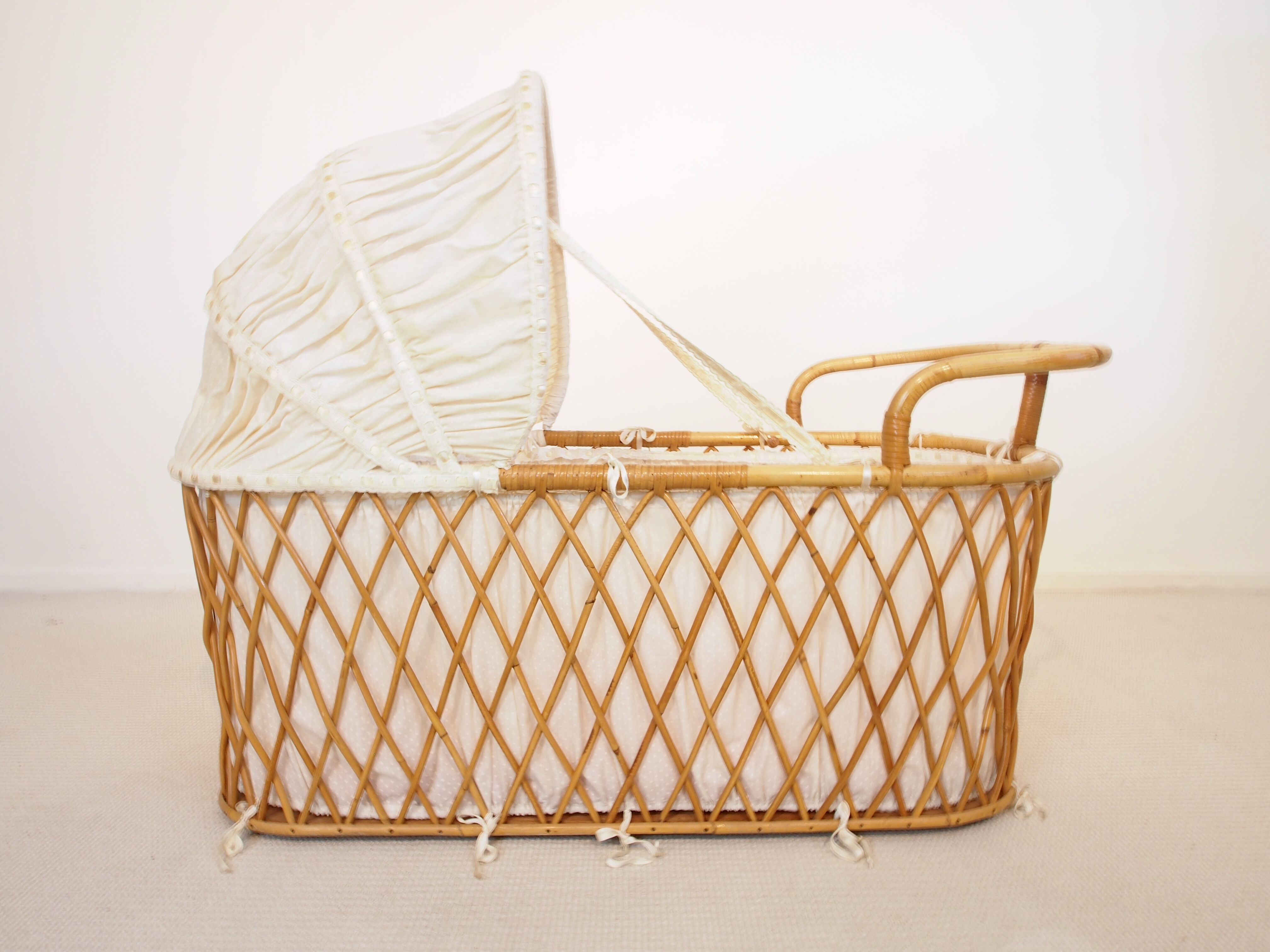 Vintage mid century rattan cradle