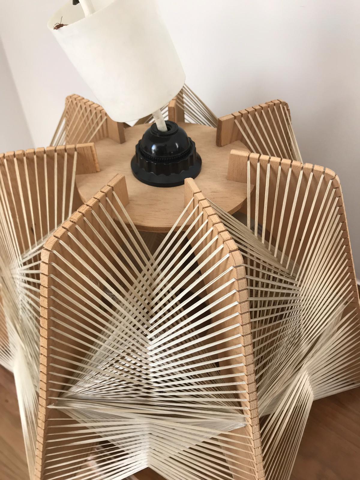 Hanging lamp of wood and thread Scandinavian style