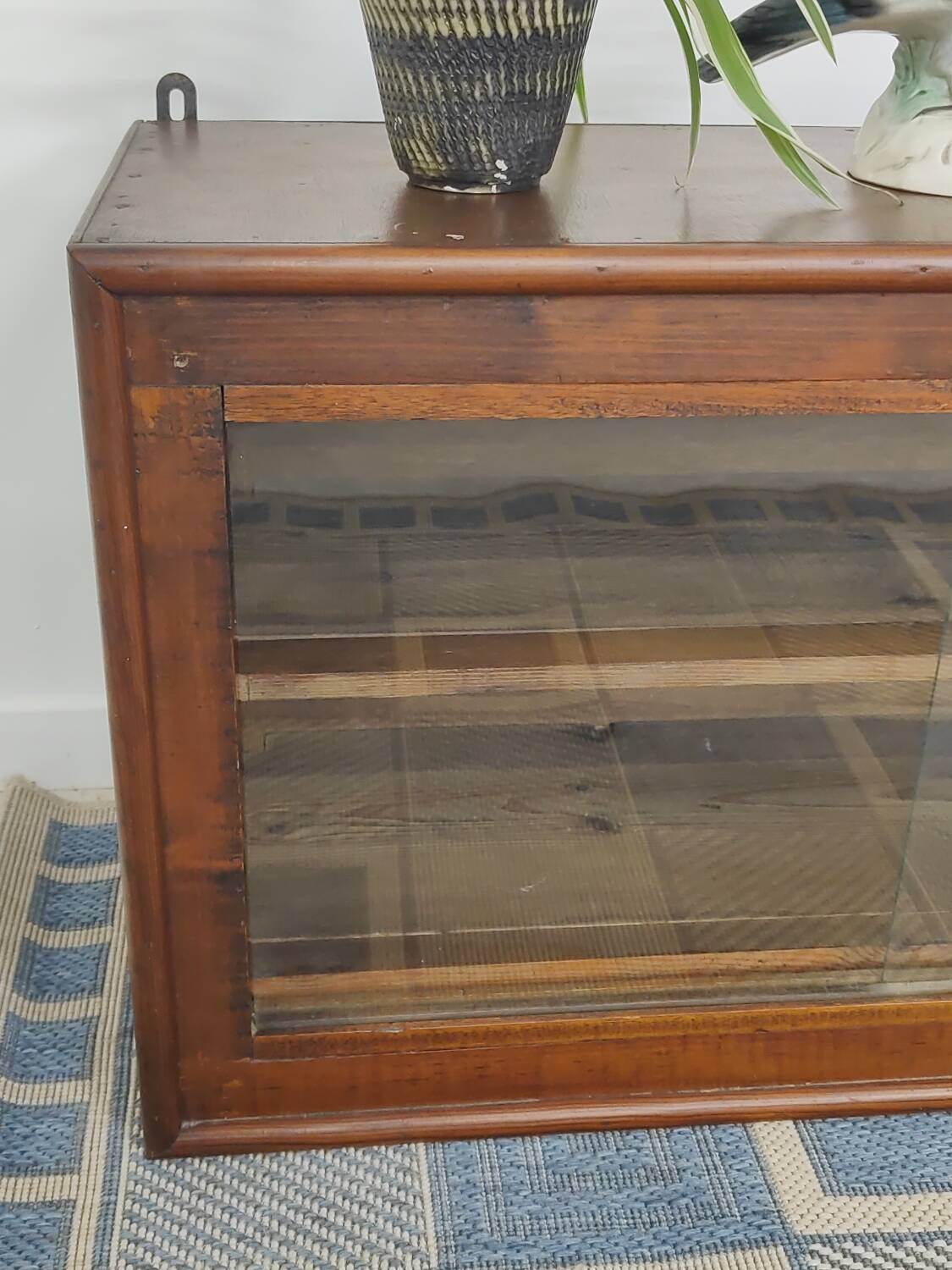 Small display case or glass wall shelf