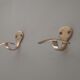 Pair of coat racks in gilded steel 70s/80s