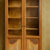 Small cabinet – Art Deco style bookcase in light wood with beveled glass.
