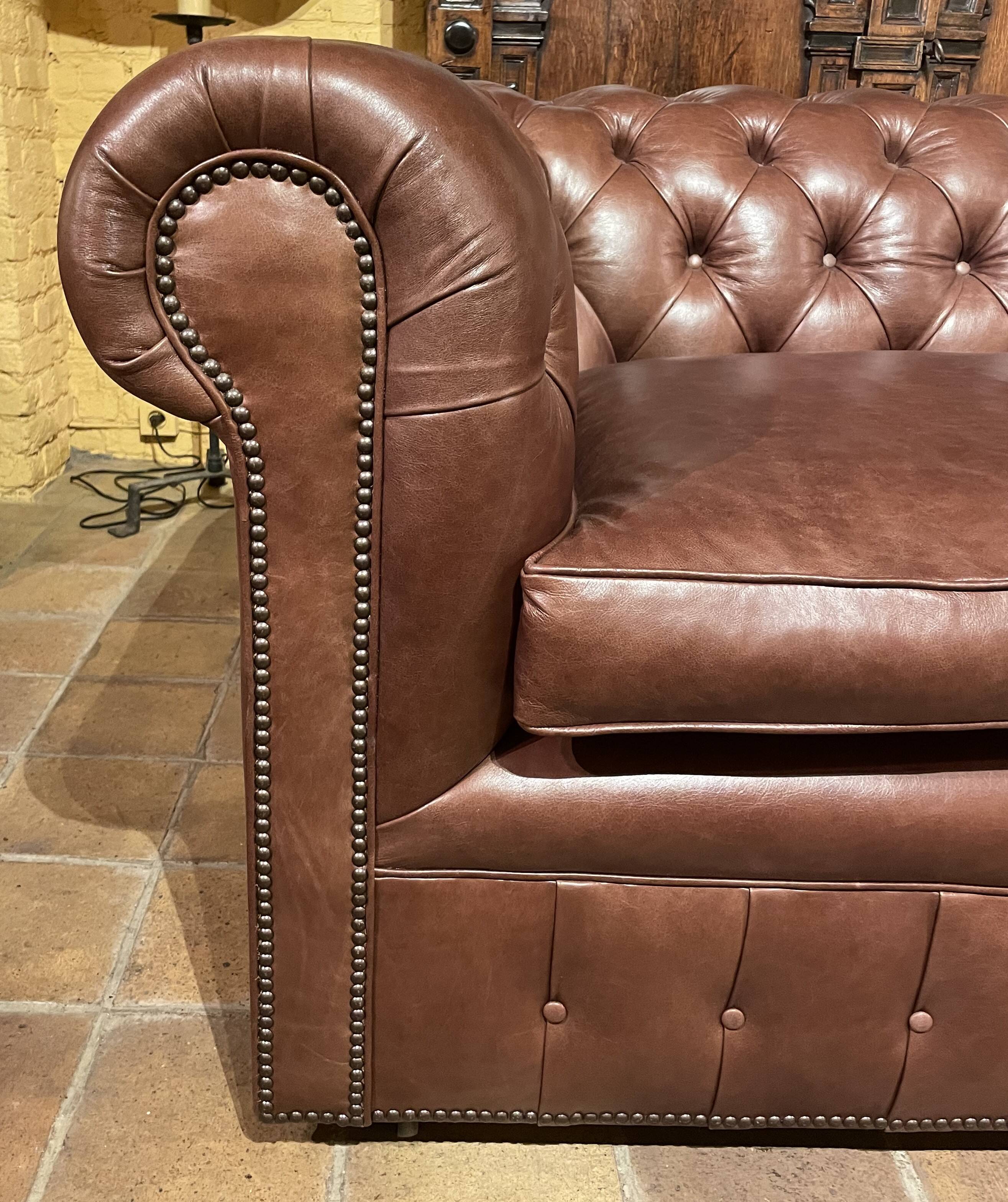 brown leather 3-seater Chesterfield sofa