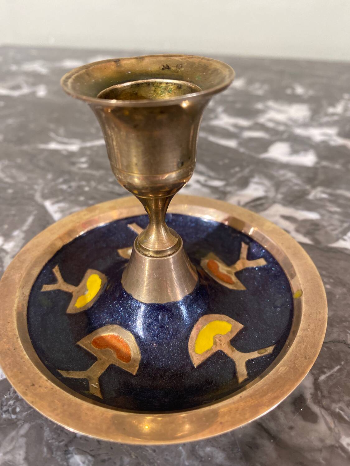Enameled brass candle holder