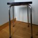 Chrome metal and orange formica stool