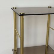 Tables d’appoint en verre et laiton