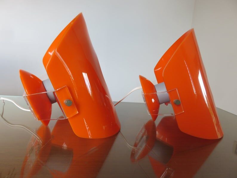 Pair of sconces in orange 70s perspex