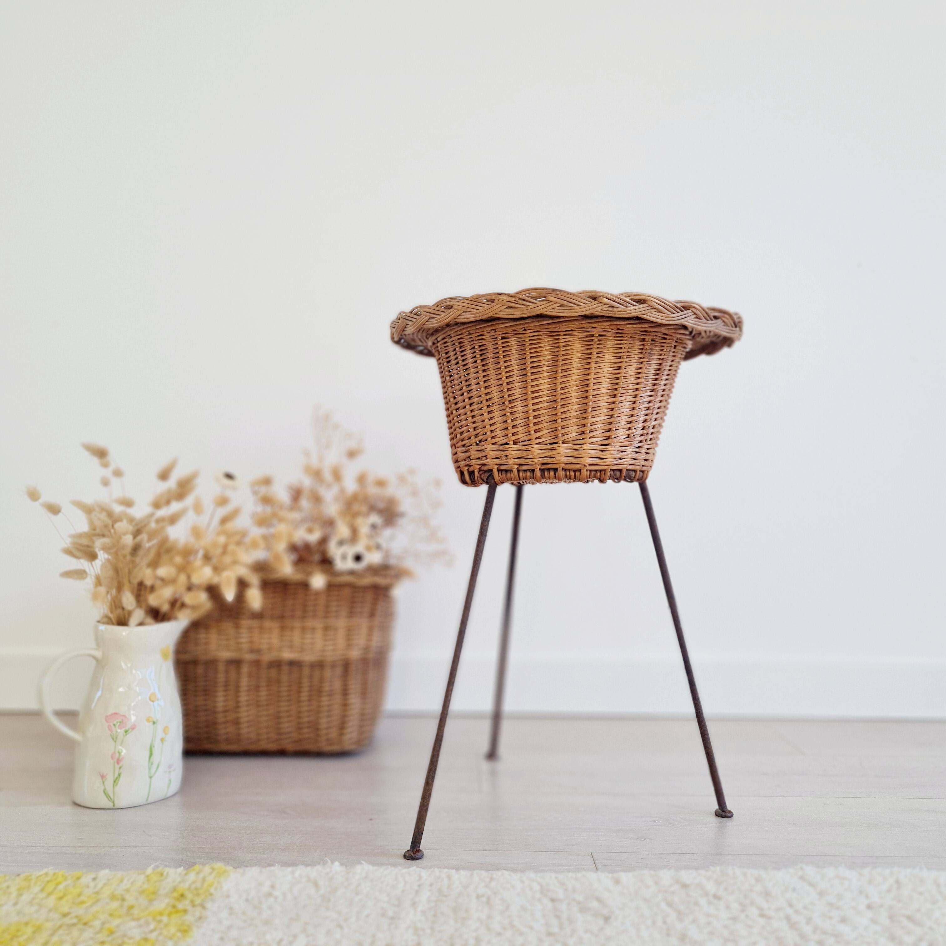Rattan and metal tripod planter