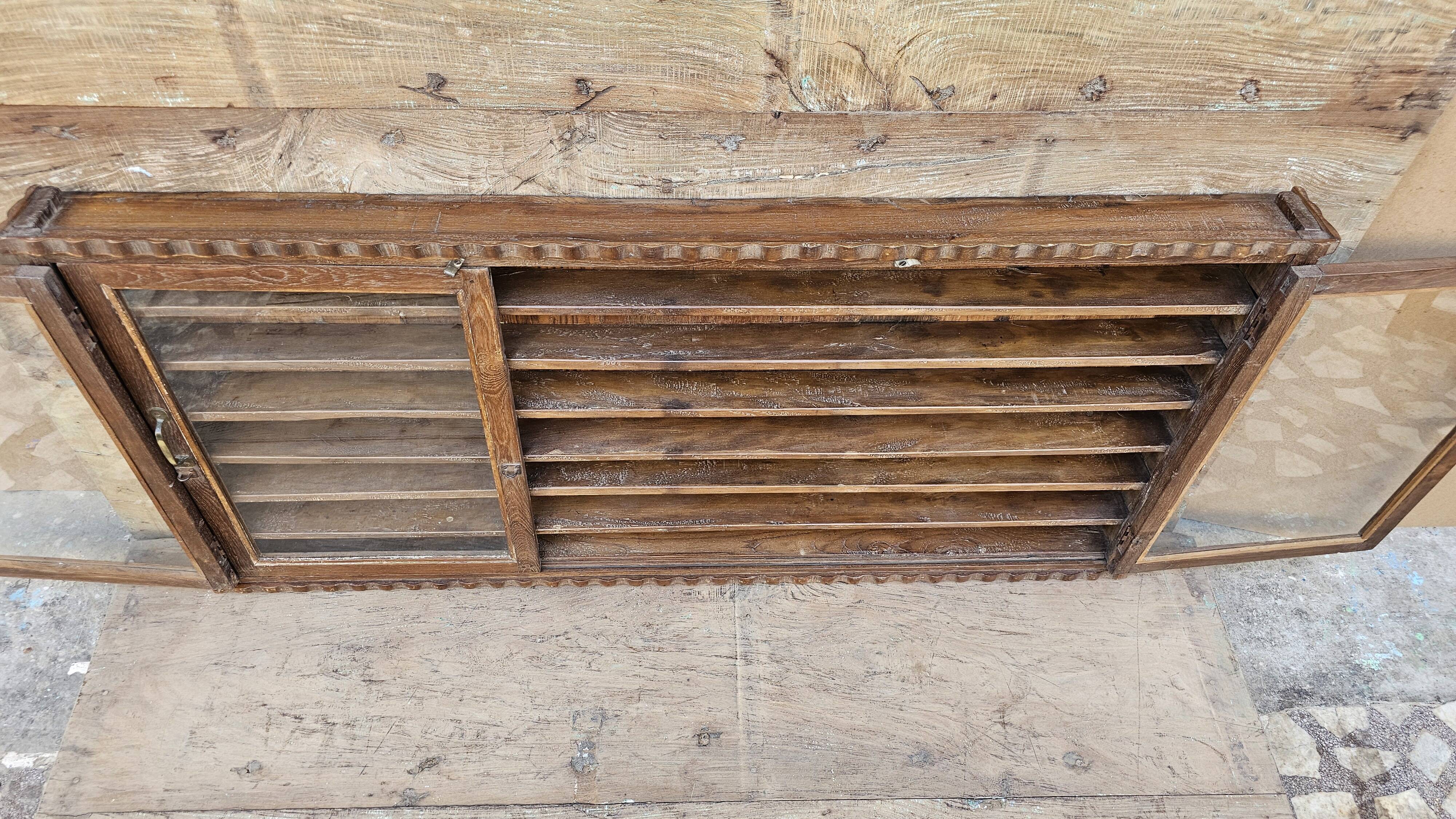 Antique Burmese teak collector's wall display case