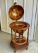 Globe bar on wheels with a rotating tray