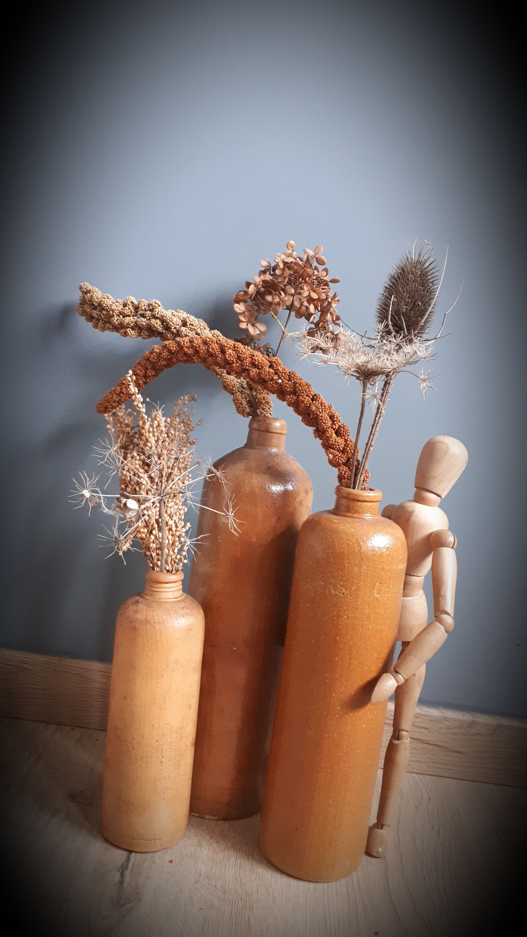 Trio of sandstone bottles 3