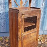 Glass-fronted entrance cabinet in Burmese teak