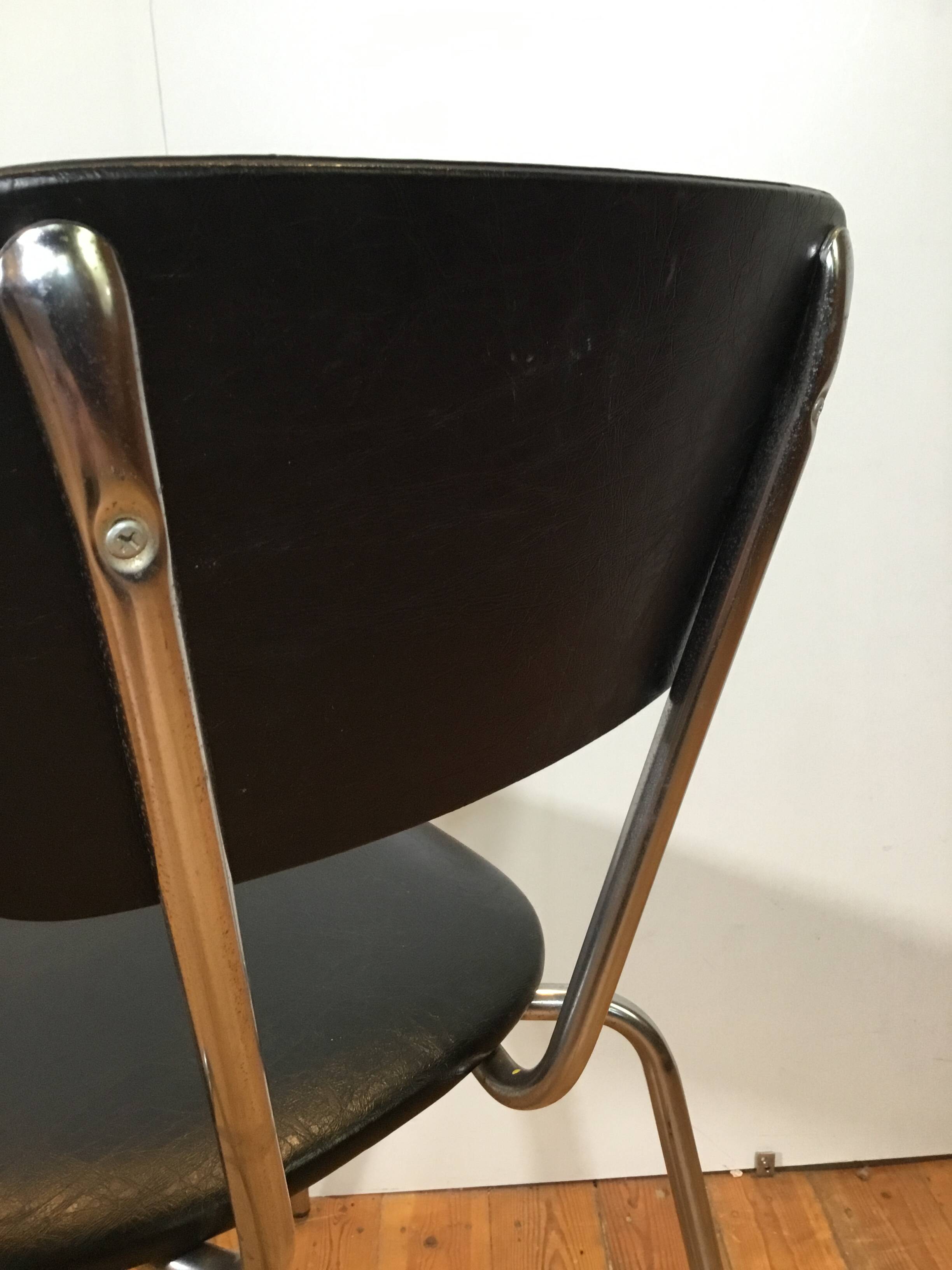 vintage chromed tubular steel stackable dining chairs