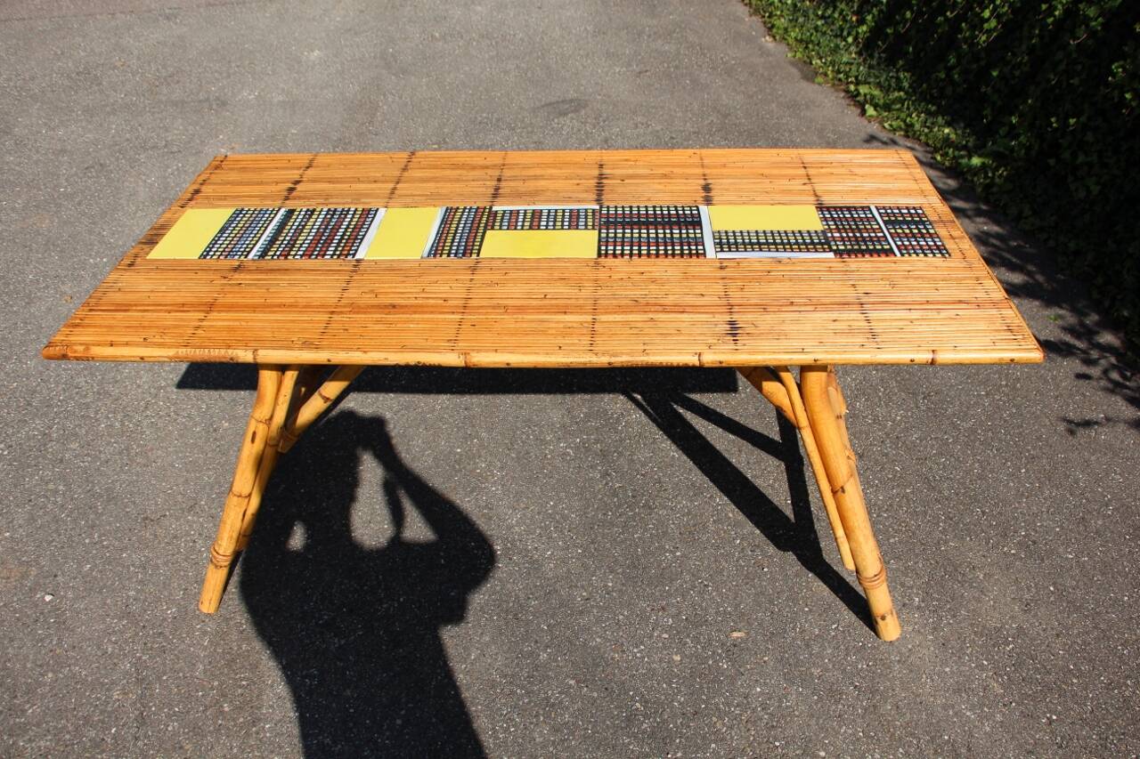 dining room table with tiles from Roger Capron