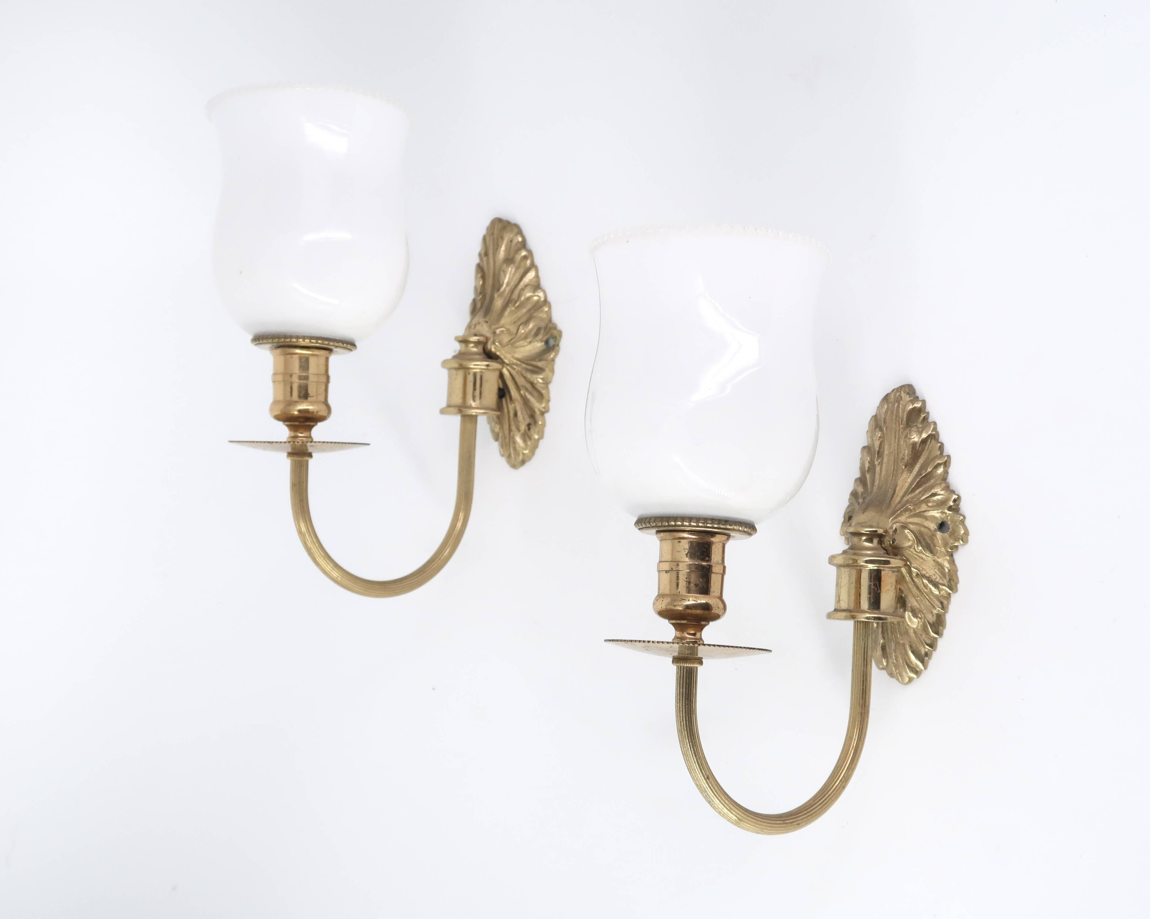Three wall lights in brass and opaque glass, 1950s
