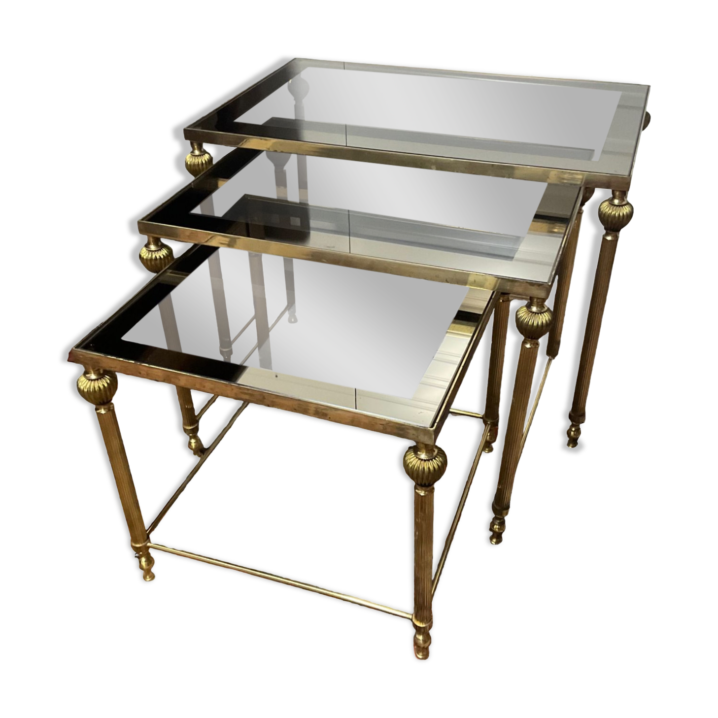 Series of 3 empire style nesting tables in brass and glass
