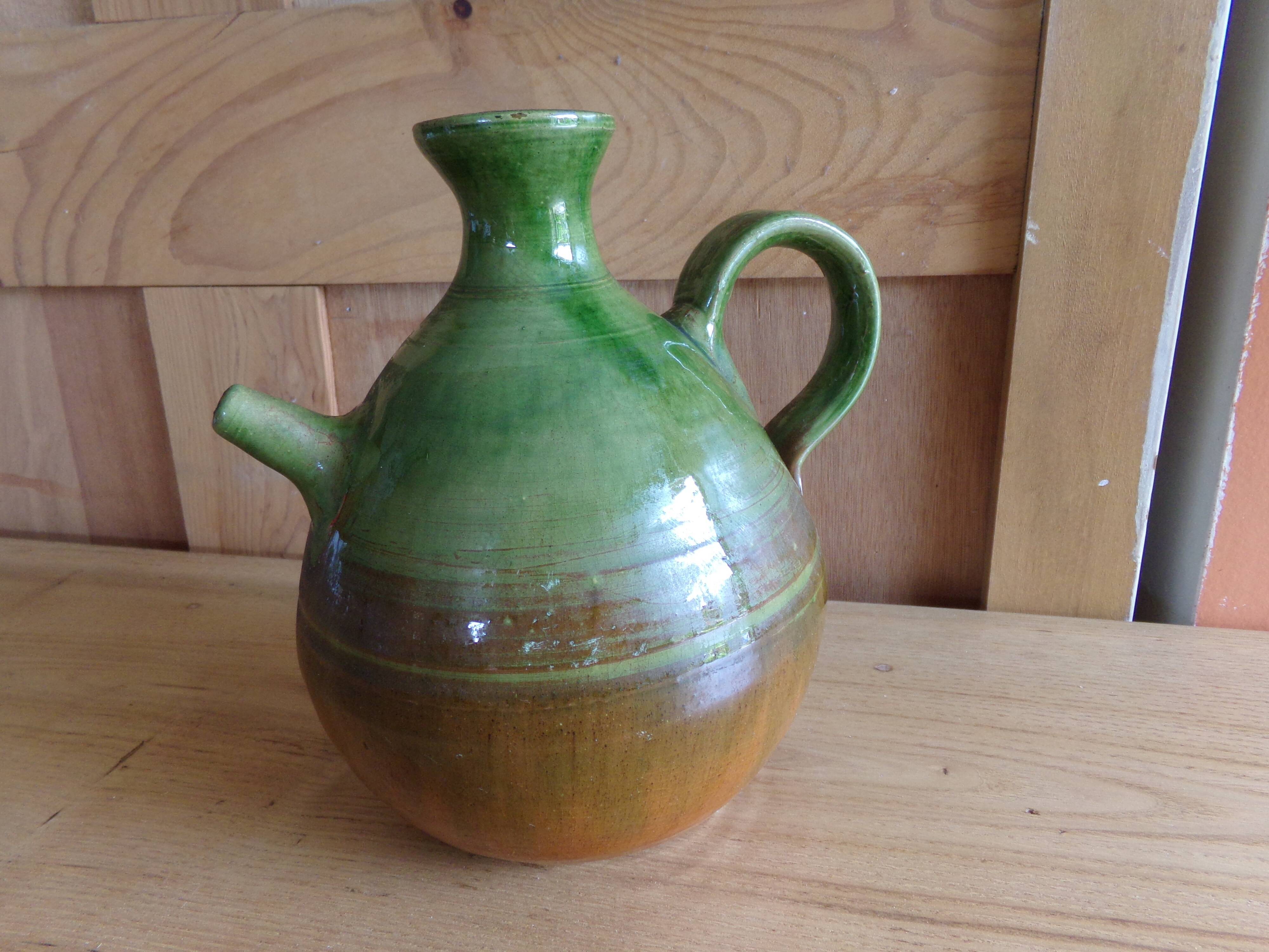 Enamelled terracotta jug