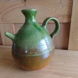 Enamelled terracotta jug