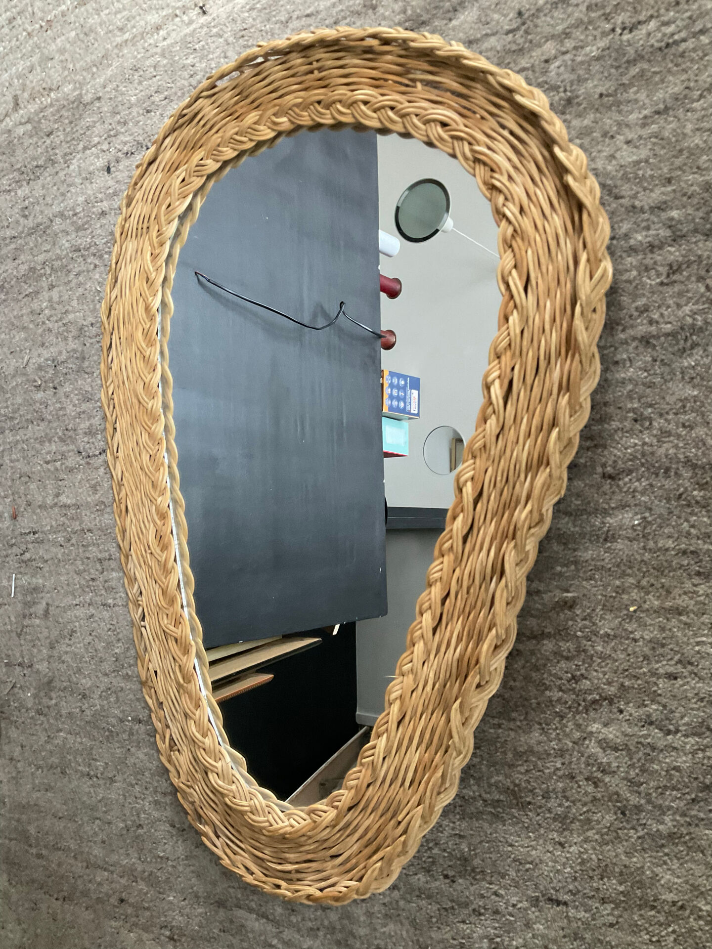 Woven wicker mirror from the 1960s