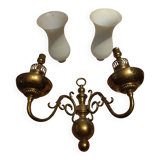 Antique brass wall sconce with two arms and glass shades