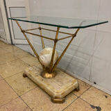 Travertine console from Fournier Paris over glass