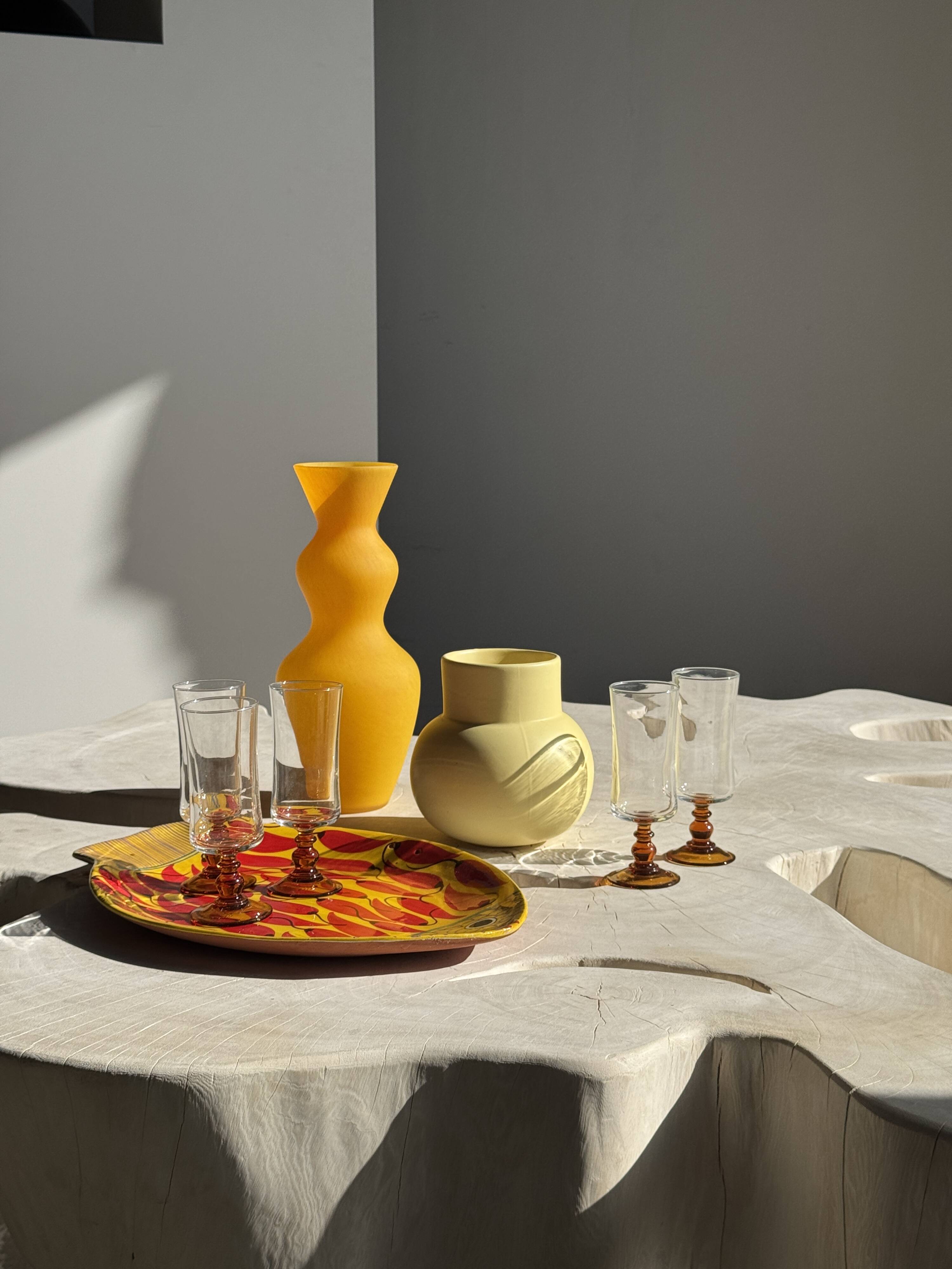 Small light yellow ball vase