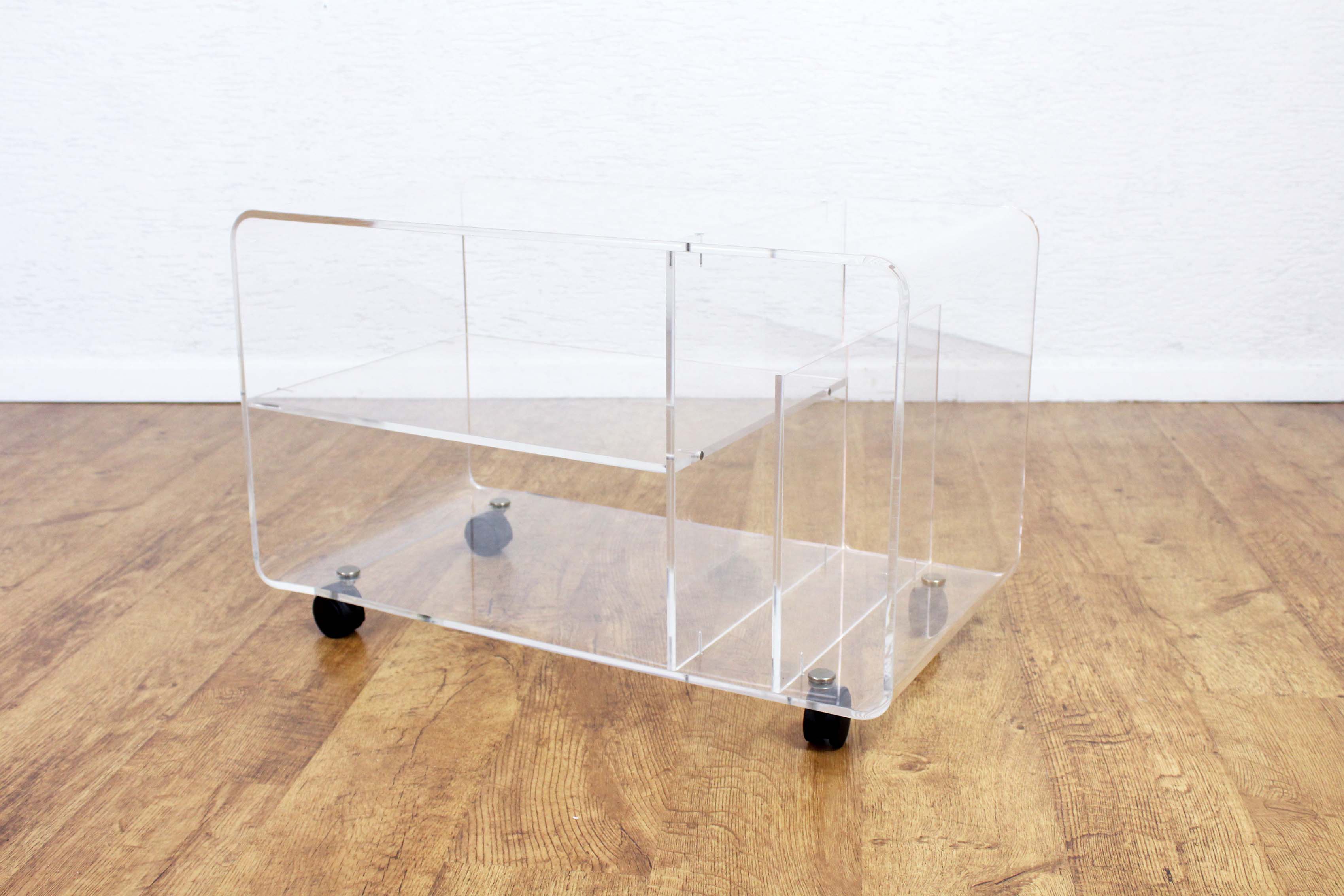 Plexiglas coffee table with vinyl compartment and magazines rack