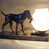 French Art Deco hunting dog on a marble base with a switched lamp.