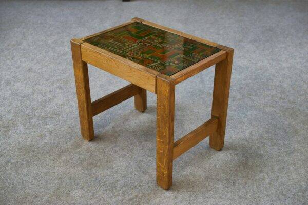 Solid oak side table with fabric decoration top