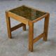 Solid oak side table with fabric decoration top