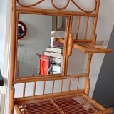 Old bamboo and rattan mirror with vintage folding shelves