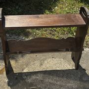 Small magazine rack / accent furniture in dark oak, late 19th century.