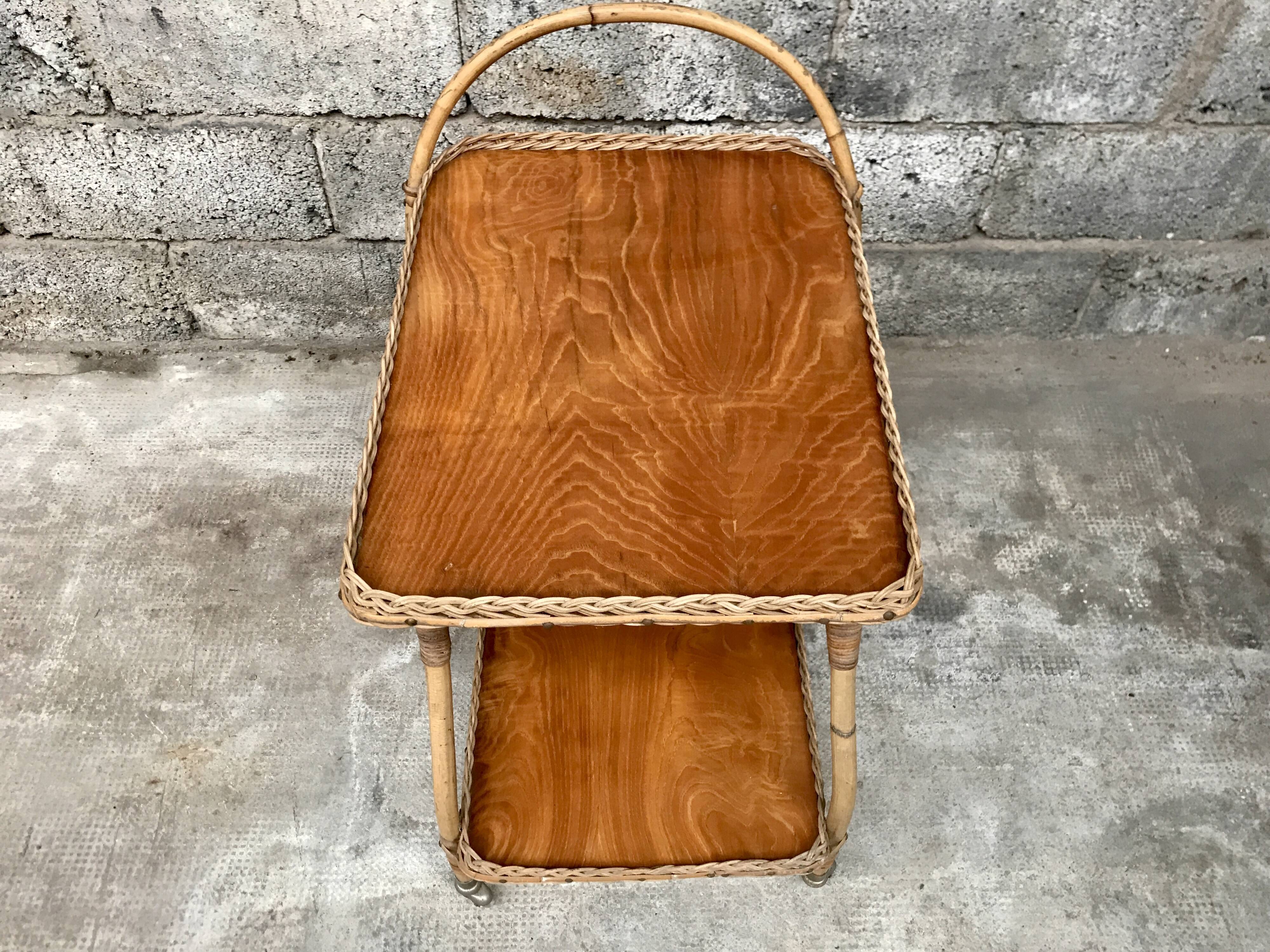 Rolling dessert in woven wicker bamboo rattan with 1950 bottle holder