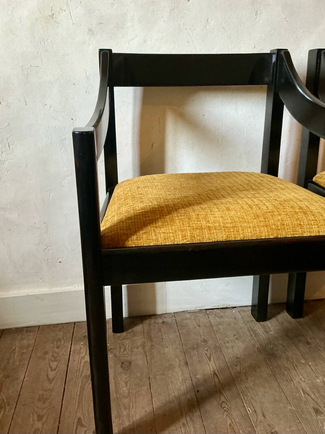 Four designer armchairs