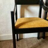 Four designer armchairs