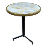 Round bistro table with a central pedestal, gold marble effect and black steel, 60cm.
