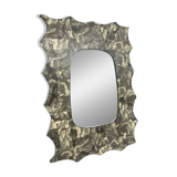 Free-form mirror decorated with cherubs