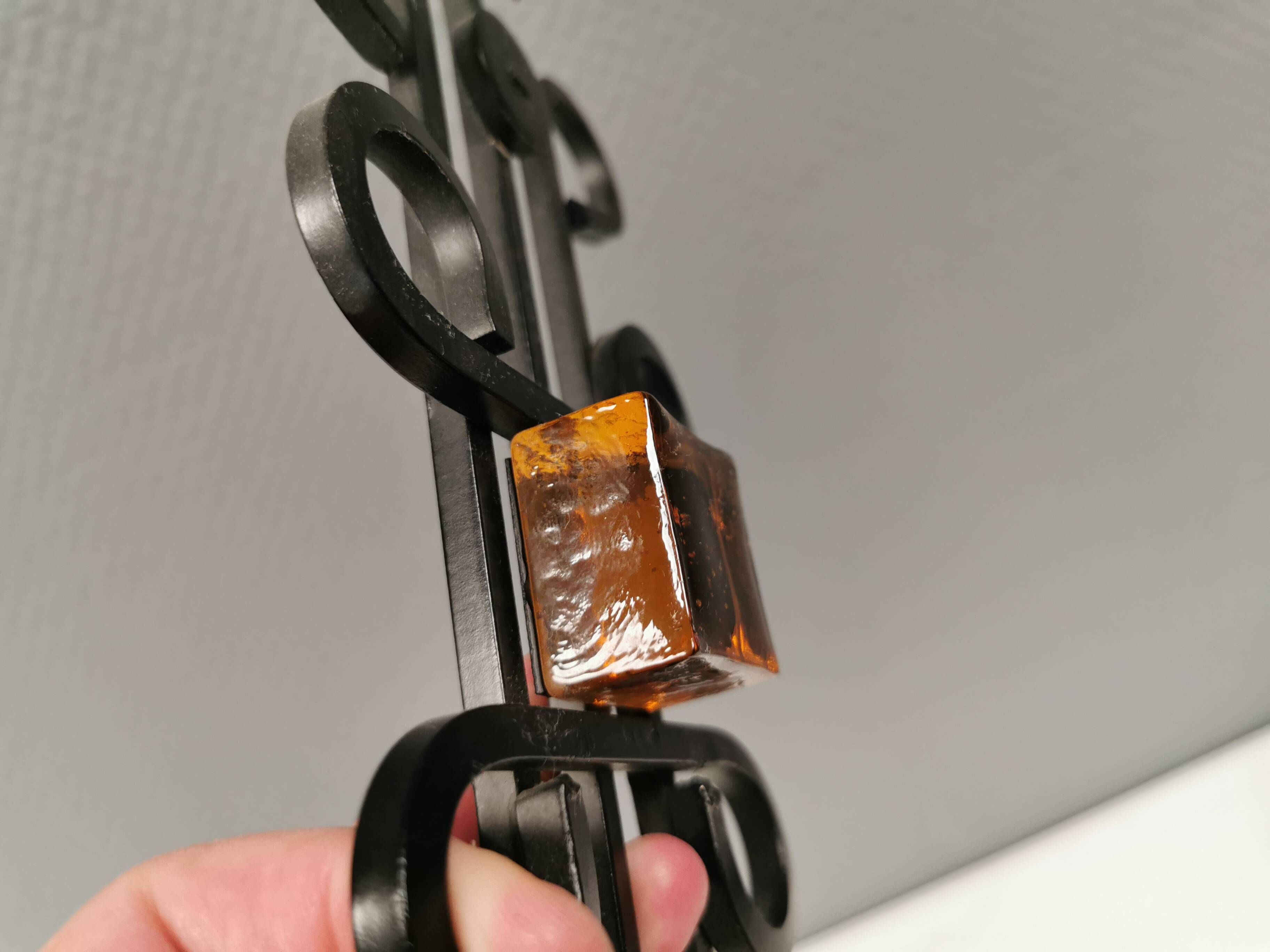 Vintage wall candle holder, wrought iron and  pressed orange/amber glass